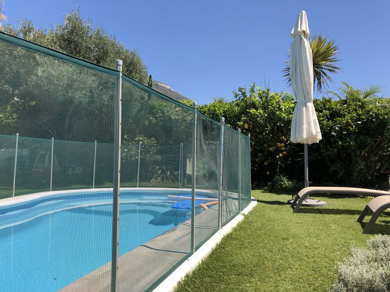Removable Mesh Fence on Pool Deck